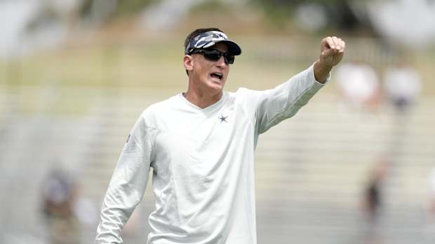 Jul 27, 2022; Oxnard, CA, USA; Dallas Cowboys quarterbacks coach Doug Nussmeier gestures during training camp at the River Ridge Fields. Mandatory Credit: Kirby Lee-USA TODAY Sports